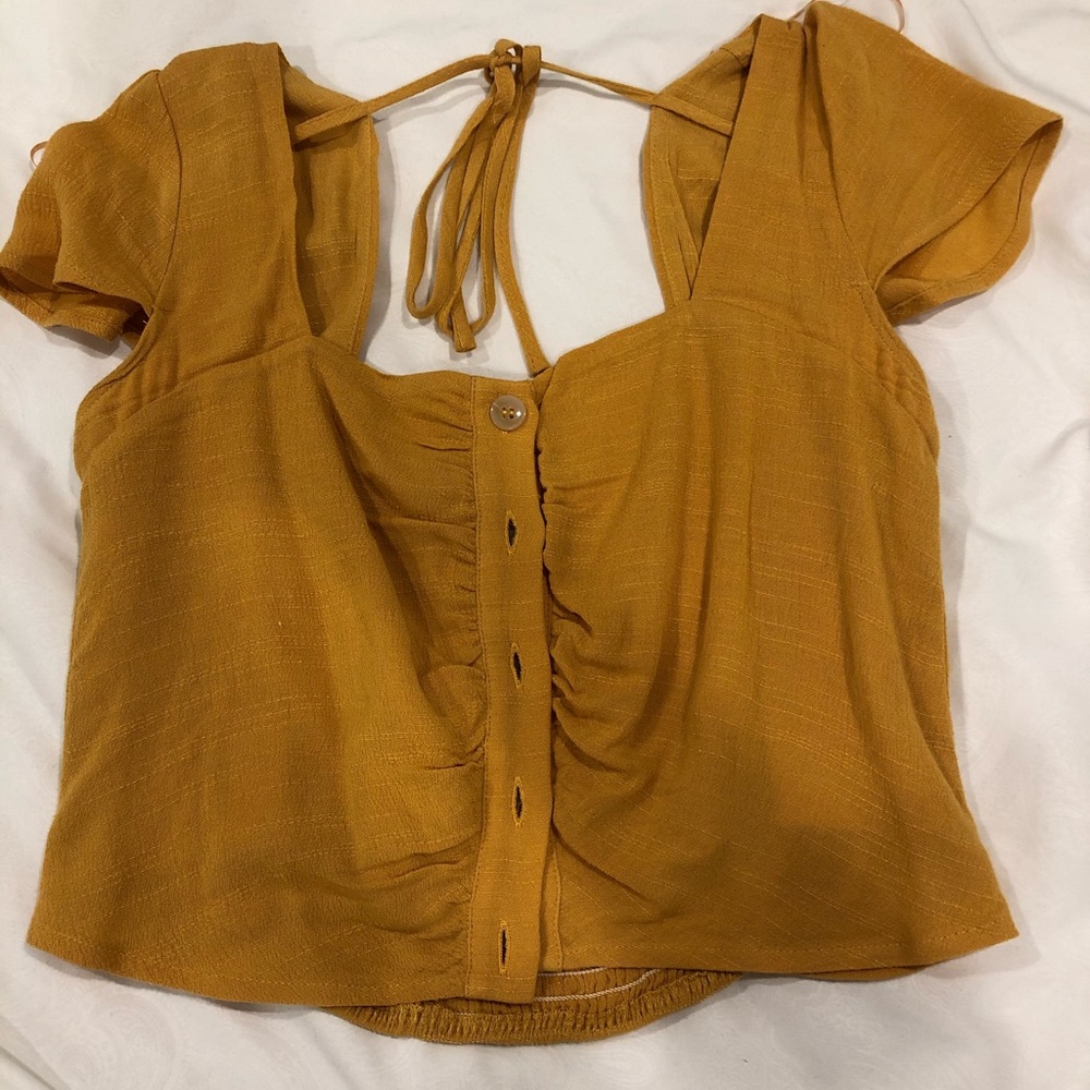 yellow button up
